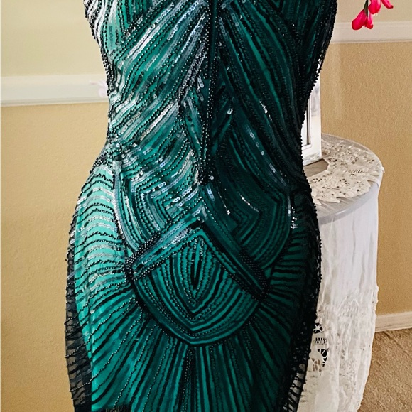 babeyono Dresses & Skirts - Black beaded dress over green with tassels on bottom